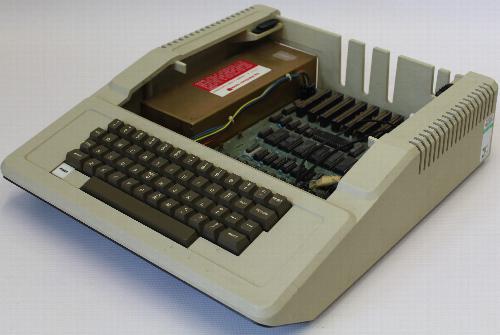 Apple II Europlus with the casing open to show board and expansion slots